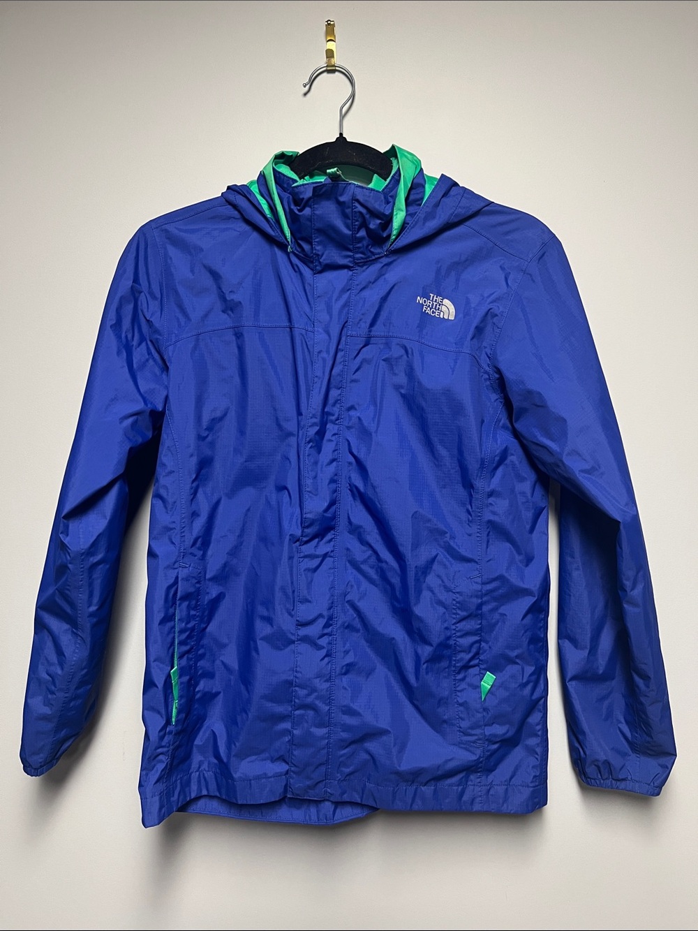 The North Face Kids Blue Hooded Raincoat with Green Trim